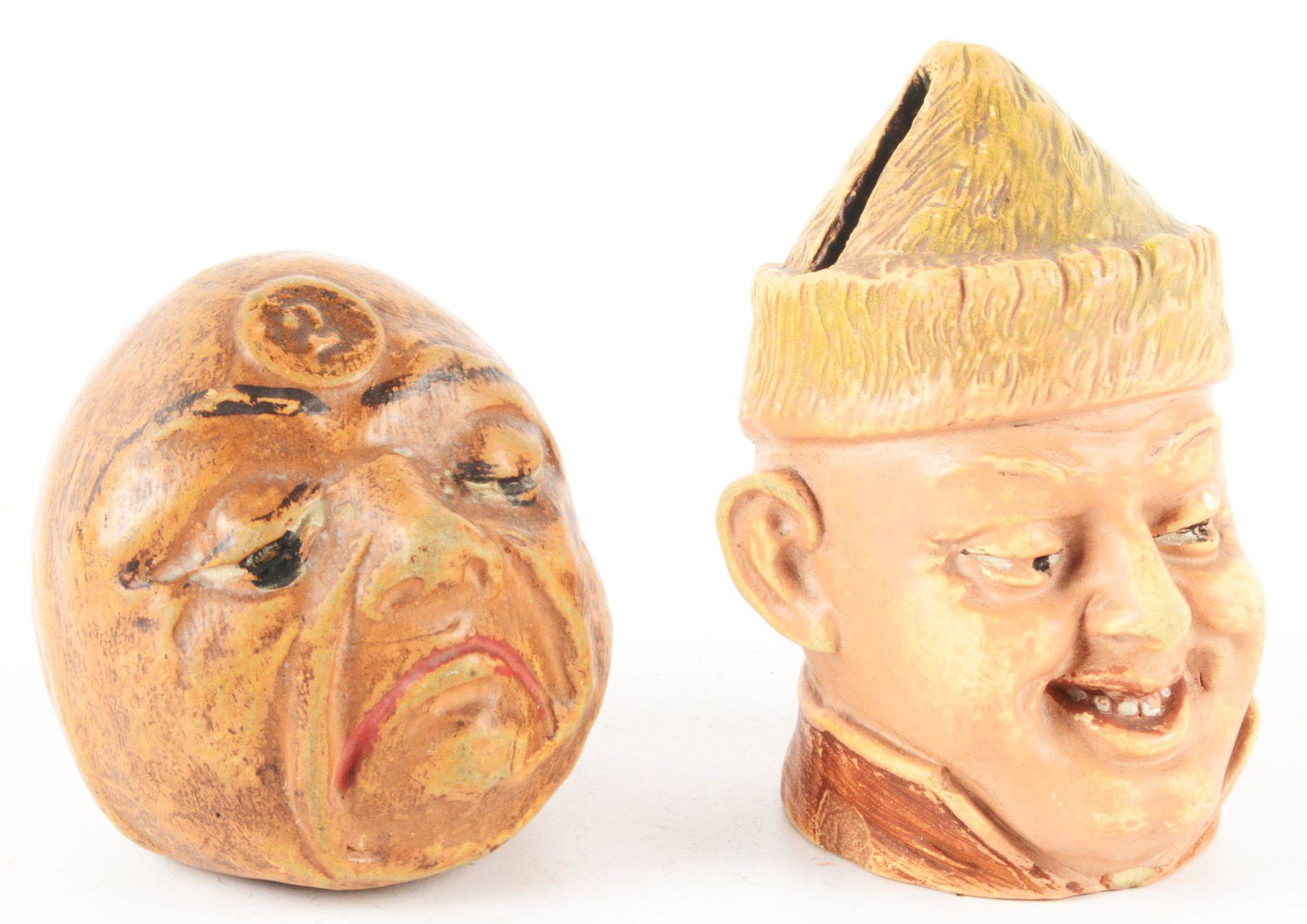 LOT OF 2: VINTAGE COMPOSITION STILL BANKS. (1 of 3)