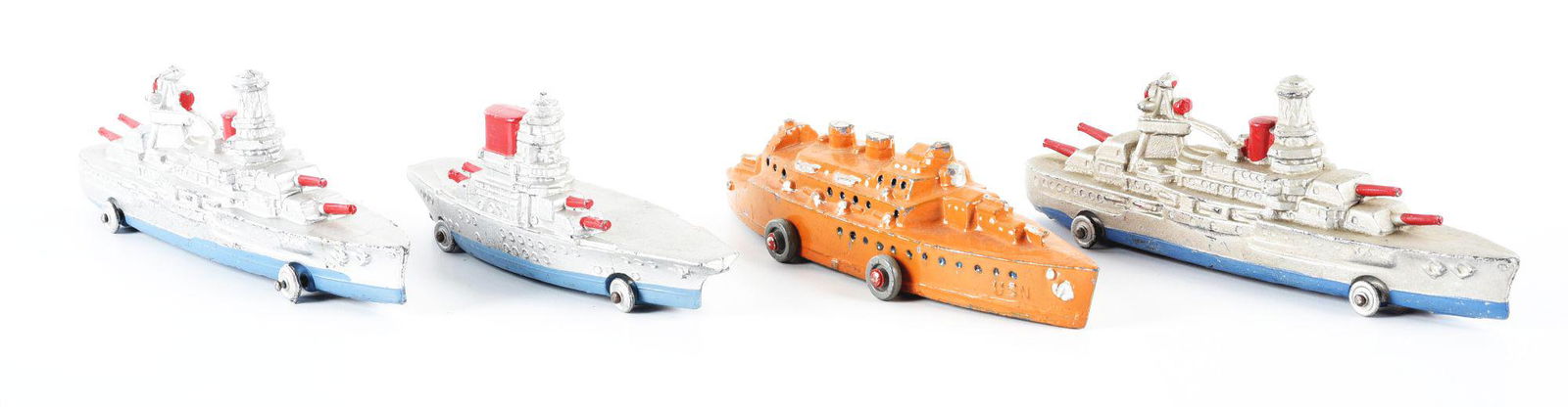 LOT OF 4: VARIOUS SLUSH MOLD WWII-TYPE SHIP TOYS. (1 of 2)