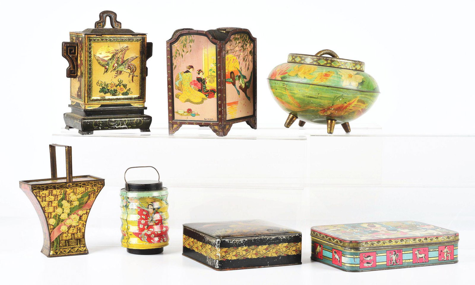 LOT OF 7: BISCUIT TINS.: Lot of seven biscuit tins. First is a Huntley & Palmer Chinese Jar, c. 1920, in fair condition with scuffing. Second is a square Huntley & Palmer Lacquer, c. 1925, in fair condition. Third is a Huntle