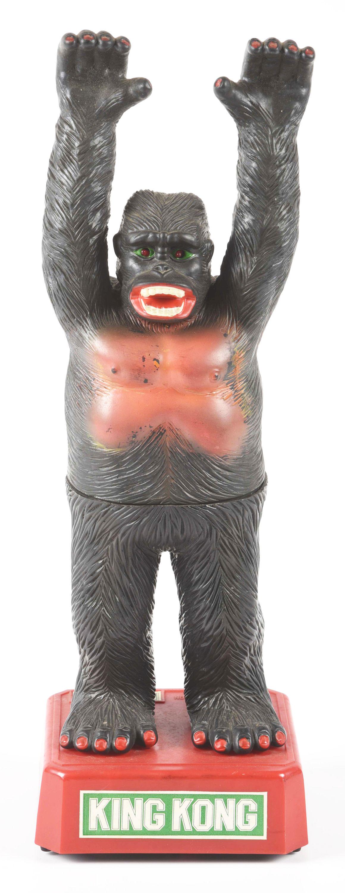 UNUSUAL PLASTIC AND VINYL BATTERY OPERATED JAPANESE KING KONG TOY.: Realistic looking King Kong on plastic base. Made by Eyi Harn. Looks to be circa 1970's. Does come apart in the middle near chest. Condition: (Very Good). Dimensions: 7" x 5 - 1/2" x 18".