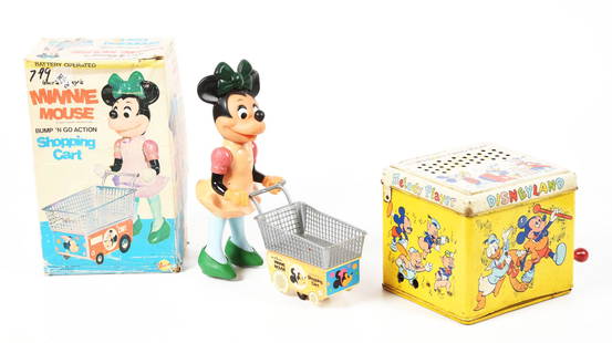 LOT OF 2: MICKEY & MINNIE MOUSE TOYS.: One is a battery-operated Minnie Mouse with shopping cart in original box. The second is a Chein Melody Organ Player toy. Both have some wear. Minnie Mouse box has some water damage. Condition: (Good