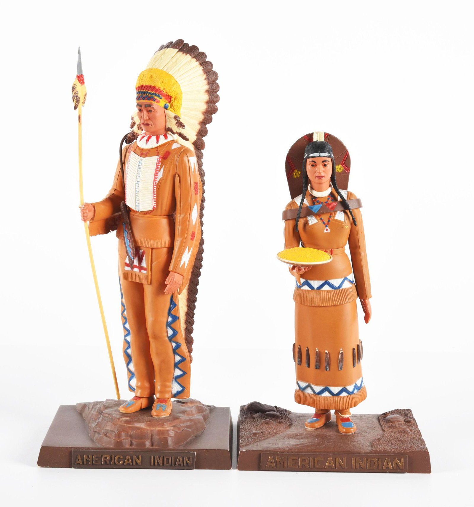 LOT OF 2: AURORA BUILT-UP AMERICAN INDIAN THEMED MODEL KITS.: First is an Indian Chief holding a spear. Second is an Indian Squaw holding a tray full of food. Both look like they were painted by the same person. Store model displays. Condition: ( Very Good - Exc