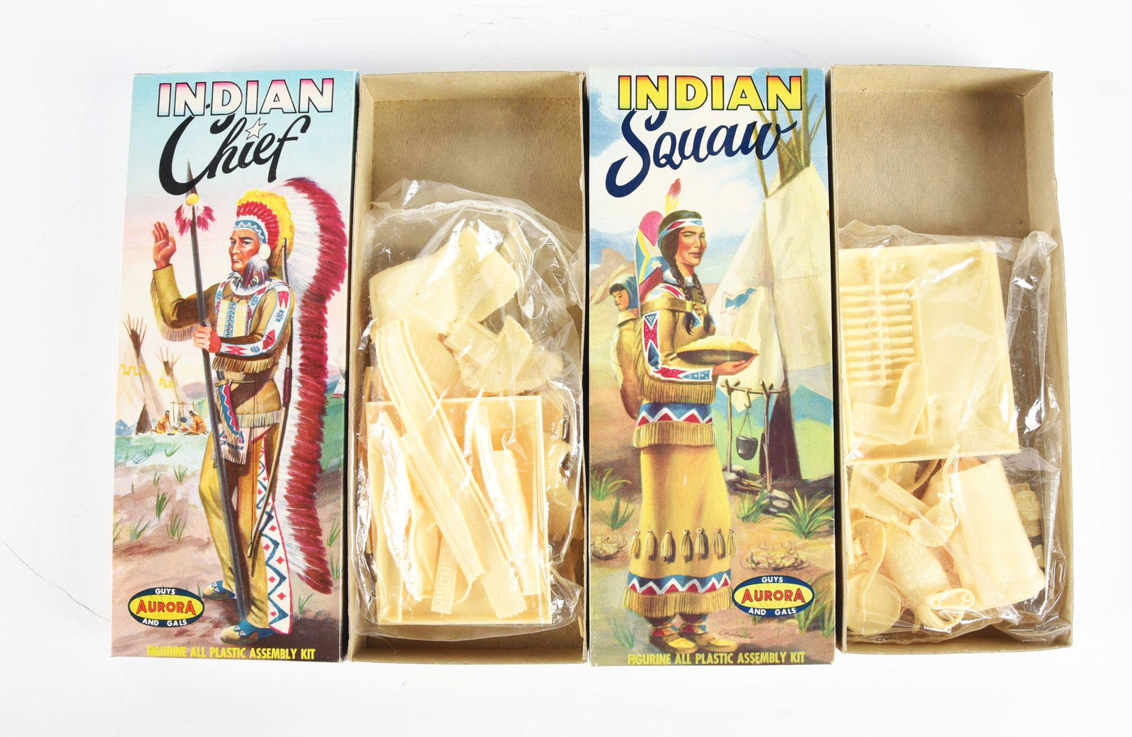 LOT OF 2: AURORA INDIAN-THEMED MODEL KITS.: One is an Indian Chief, the other an Indian Squaw. Both in original boxes with parts sealed in plastic. Some edge wear to boxes. Condition: (Excellent). Dimensions: 13 - 3/4" x 5 - 3/4" x 2 - 1/2".