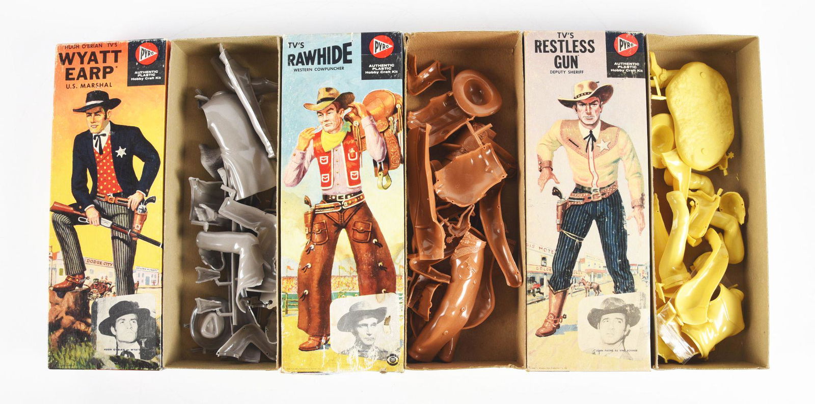 LOT OF 3: PYRO TV COWBOY-THEMED MODEL KITS.: All in original boxes. There is a Restless Gun Starring John Payne as Vint Bonner, a Wyatt Earp Starring Hugh O'Brian and a Rawhide Starring Eric Fleming. All are unbuilt with instruction sheets. Boxe