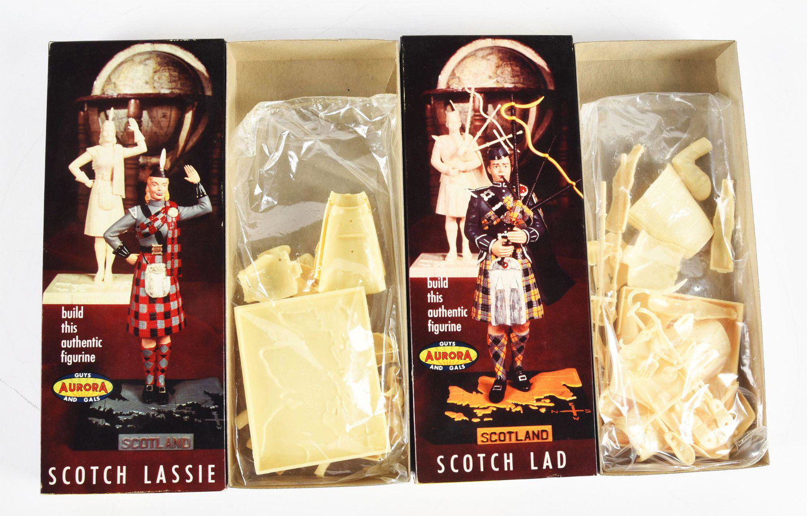 LOT OF 2: AURORA SCOTCH LAD AND SCOTCH LASSIE MODEL KITS.: Both in original boxes, unbuilt and with instructions. Some slight edge wear. Condition: (Excellent). Dimensions: 13 - 3/4" x 5 - 3/4" x 2 - 1/2".