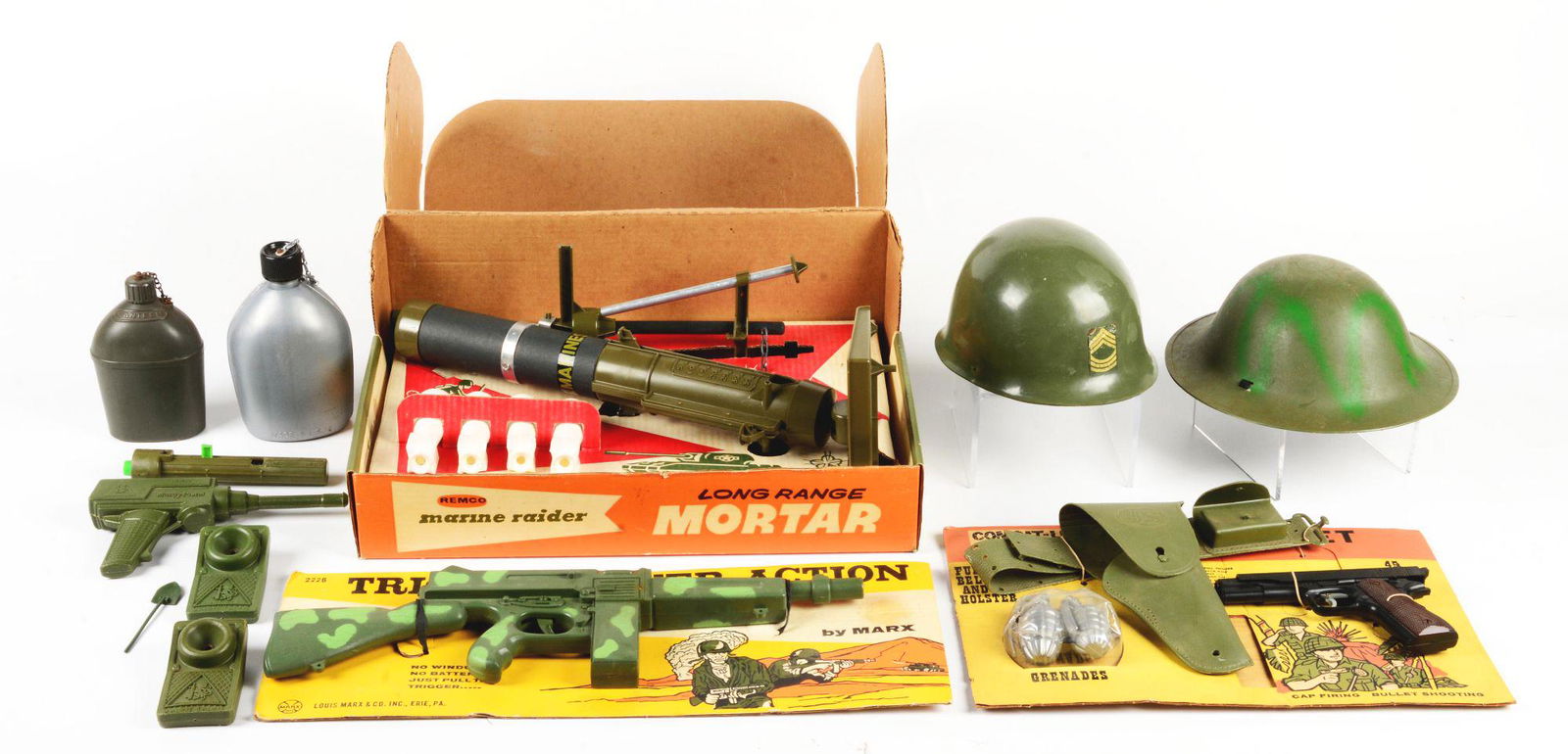 NICE LOT OF VINTAGE REMCO AND MARX MILITARY-THEMED TOYS.: Lot includes a Remco Marine Raider Long-Range Mortar Set in box, with shells, telescopic sight, original price tag on side for $3.99 at Nestor's Store. There is also a Marx Sidearms Set, with a .45 to