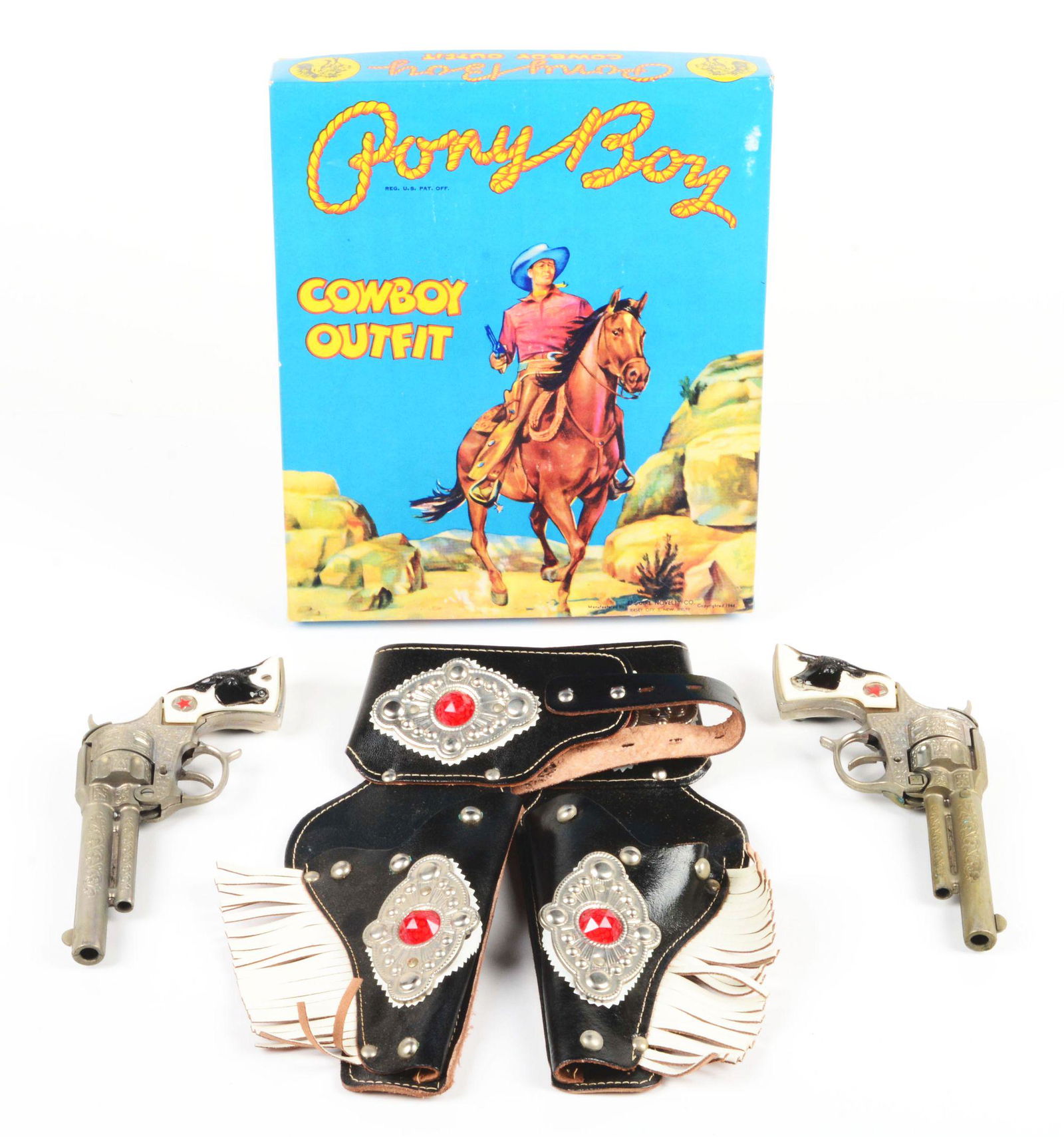 ESQUIRE NOVELTY COMPANY PONY BOY COWBOY OUTFIT SET.: Nice colorful original box, showing a cowboy on horse holding a pistol in right hand. Looks like unused, near mint old store stock with tag, c. 1954. Two Texan Jr. guns with holsters, belt, cardboard
