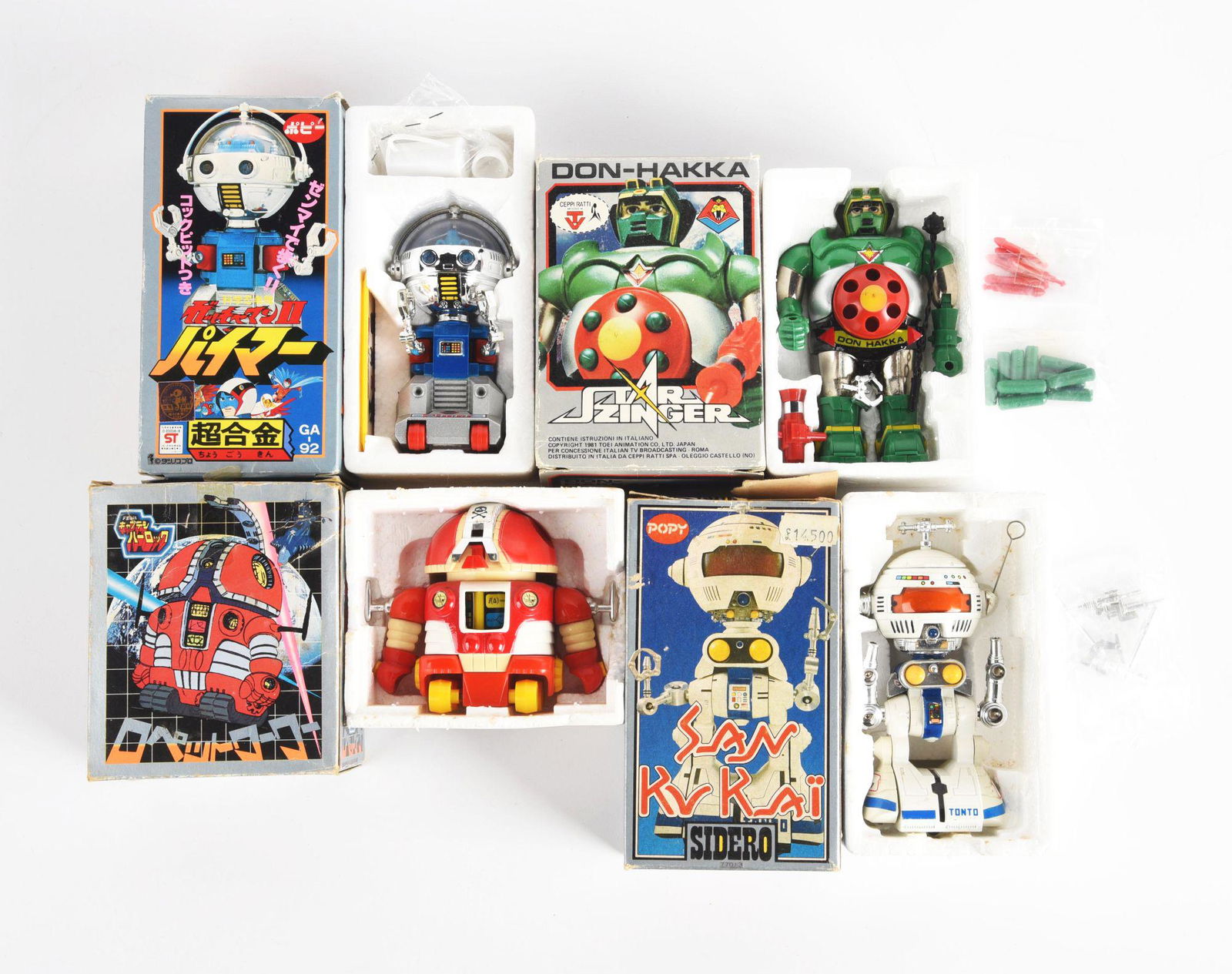 LOT OF 4: JAPANESE DIECAST FIGURES IN ORIGINAL BOXES. (1 of 2)