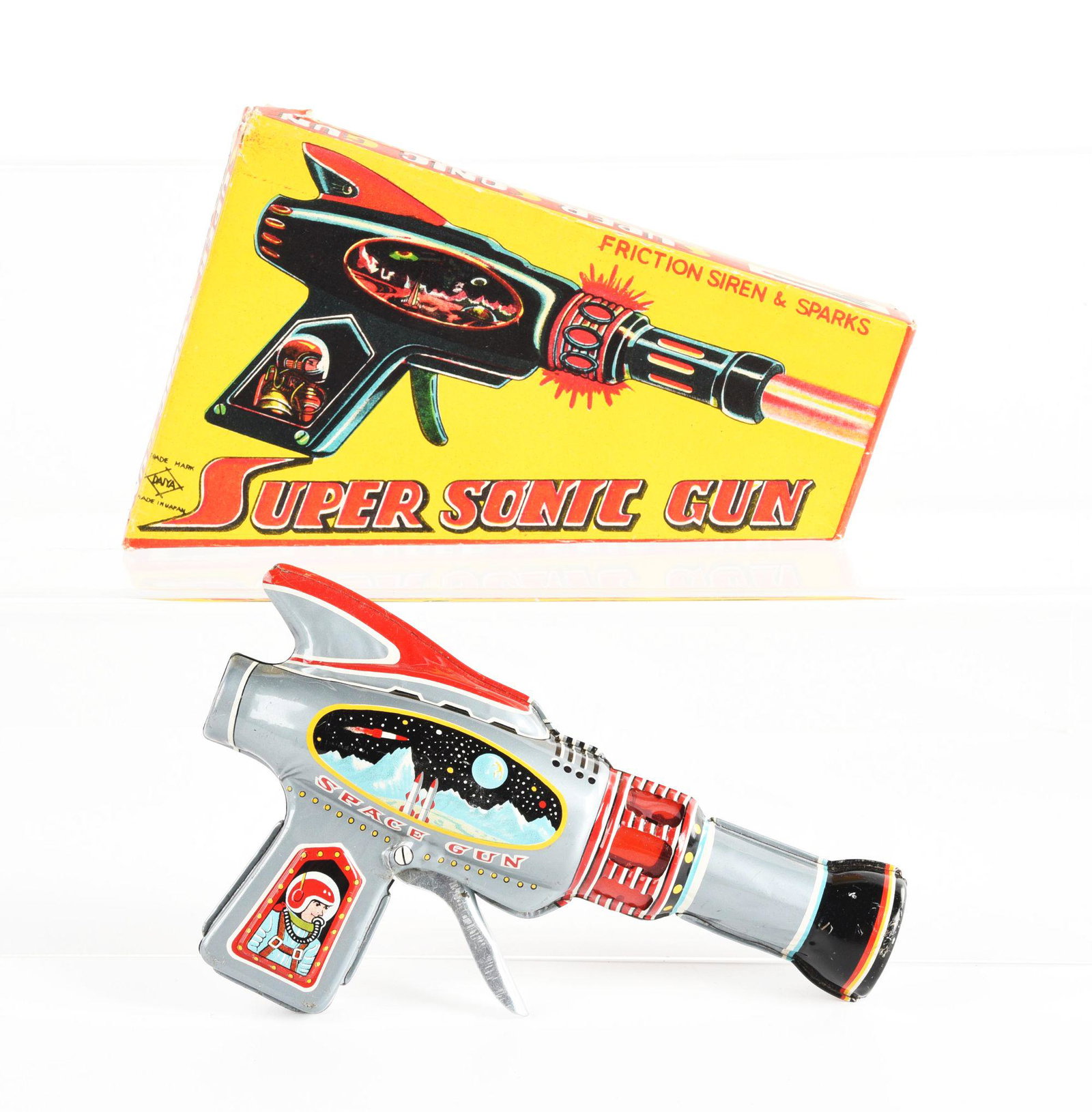 JAPANESE TIN LITHO FRICTION SUPER SONIC RAY GUN IN ORGINAL BOX.: Made by daya Japan. Beautiful litho. Condition: (Excellent). Dimensions: 7 - 3/4" x 4 - 1/2" x 1 - 1/2".