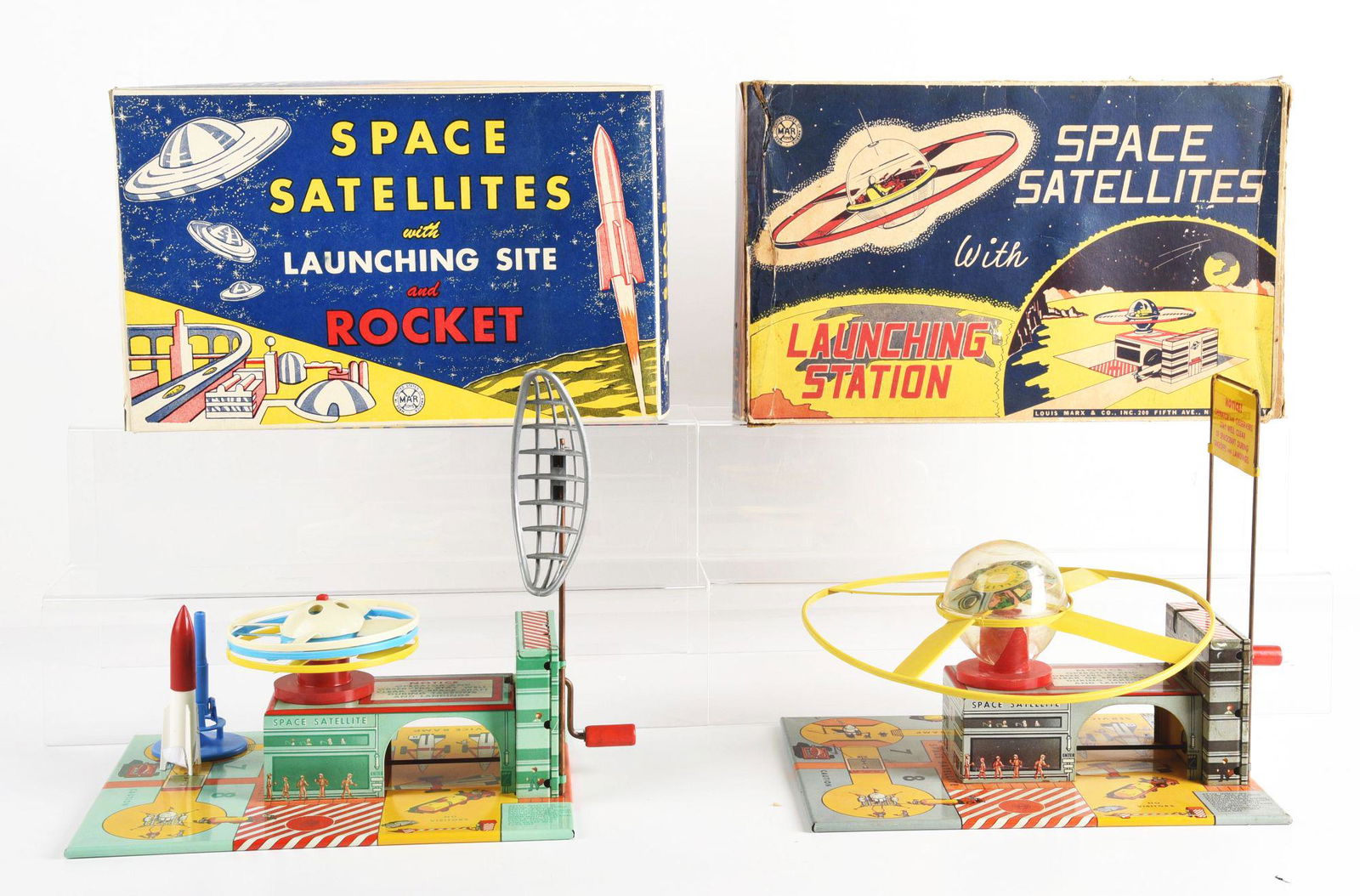 LOT OF 2: MARX PLASTIC & TIN LITHO SPACE SATELITE STAION TOYS IN ORIGINAL BOXES. (1 of 2)