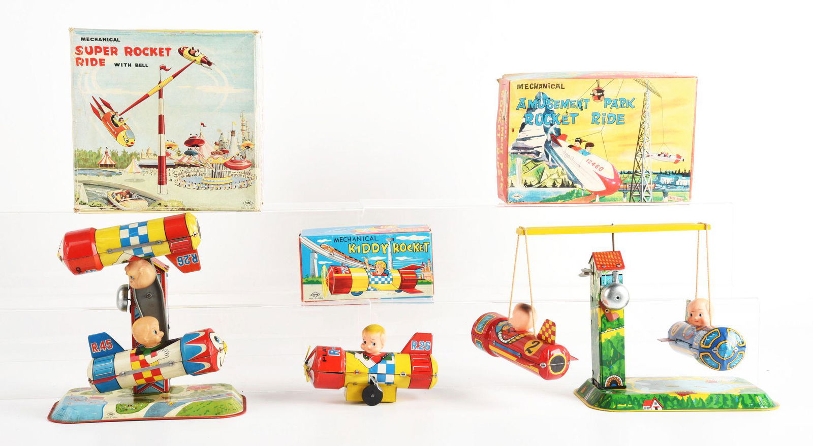 LOT OF 3: JAPANESE TIN LITHO WIND UP ROCKET RIDES IN ORIGINAL BOXES. (1 of 2)
