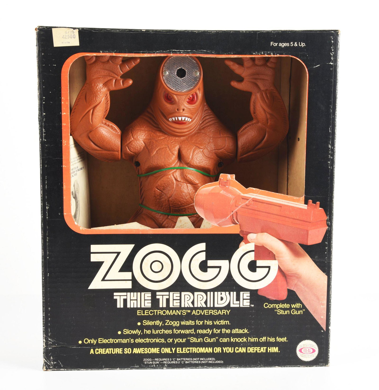 IDEAL BATTTERY OPERATED ZOGG THE TERRIBLE IN ORIGINAL BOX.: Complete with gun and manual. Unused. Condition: (Very Good - Excellent). Dimensions: 17" x 14 - 1/2" x 6 - 1/2".