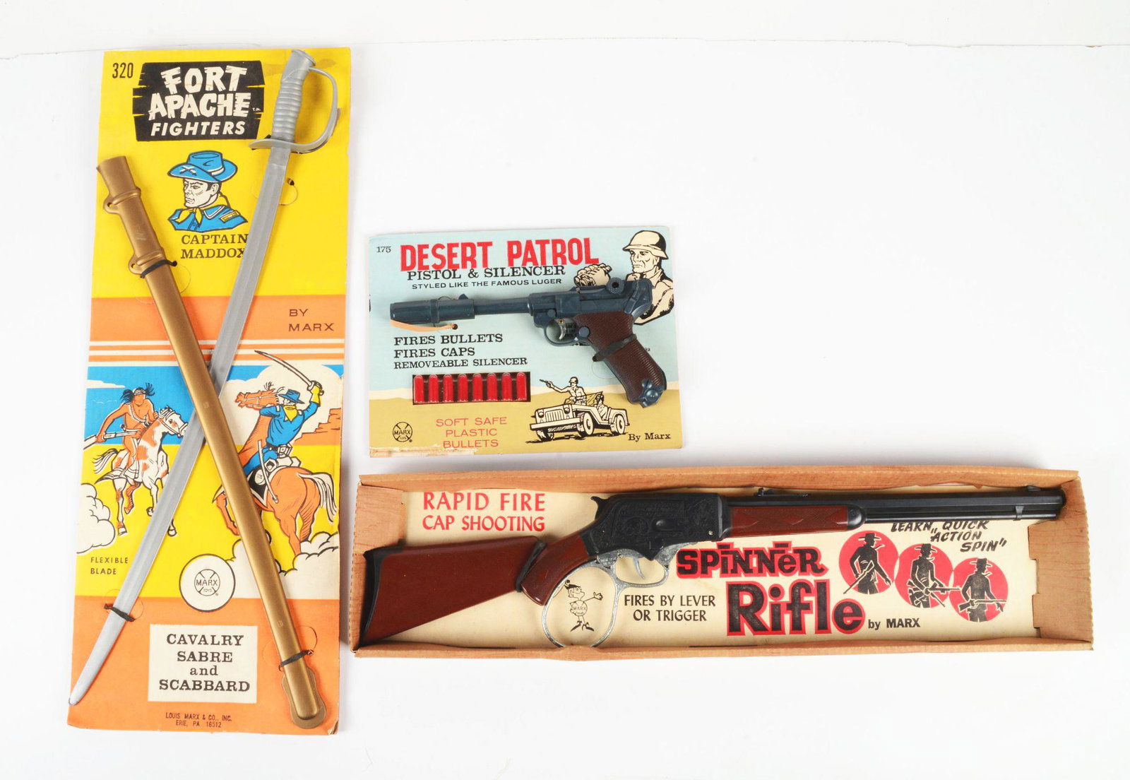 LOT OF 3: VINTAGE MARX MILITARY-TYPE WEAPON TOYS.: All in original cards or boxes: a Desert Patrol Pistol and Silencer, styled like a Luger, with bullets still sealed in plastic; a Rapid Fire Spinner Rifle in open-front box; and a Fort Apache Fighters