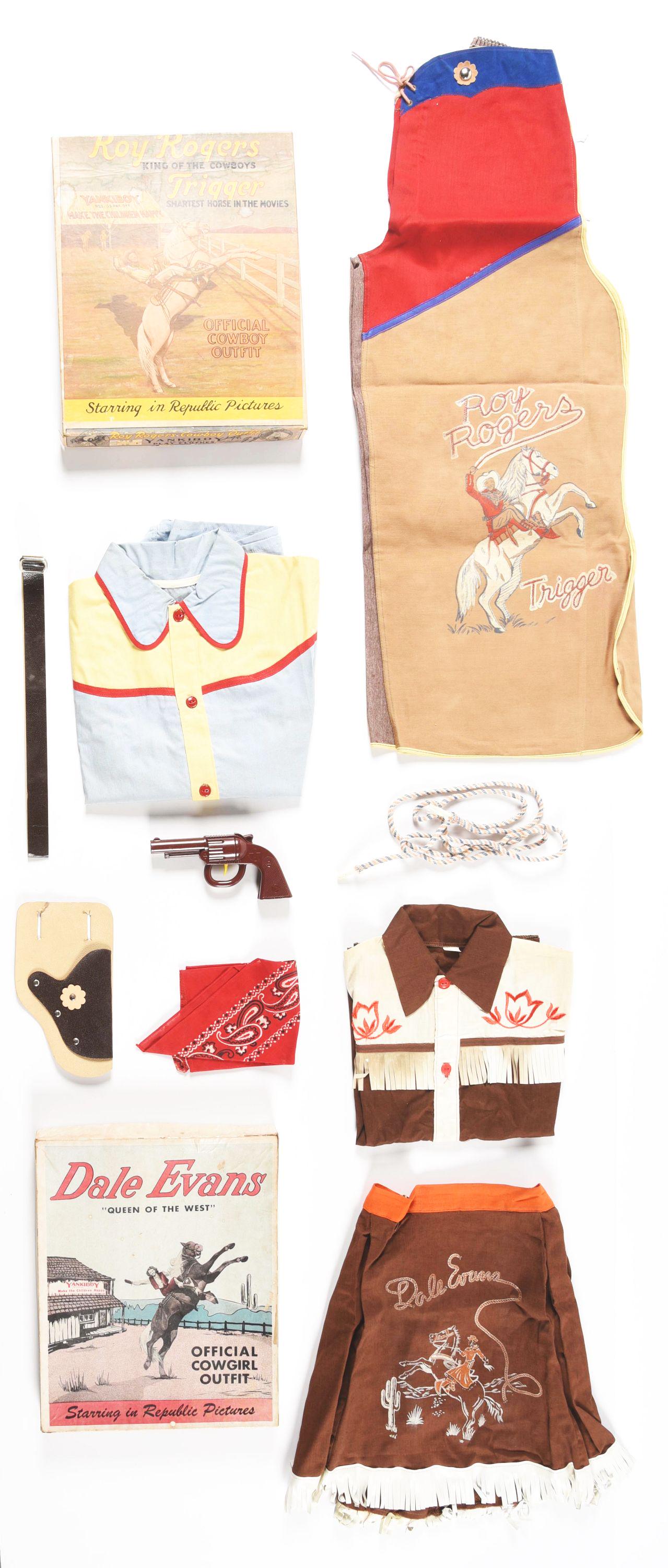 LOT OF 2: ROY ROGERS AND DALE EVANS WESTERN COWBOY AND COWGIRL OUTFITS.: Both in original boxes and made by Yanki Boy. Both showing Roy and Dale on their horses Trigger and Buttercup. Look to be unused. Boxes have some staining and wear. Condition: (Very Good - Excellent).