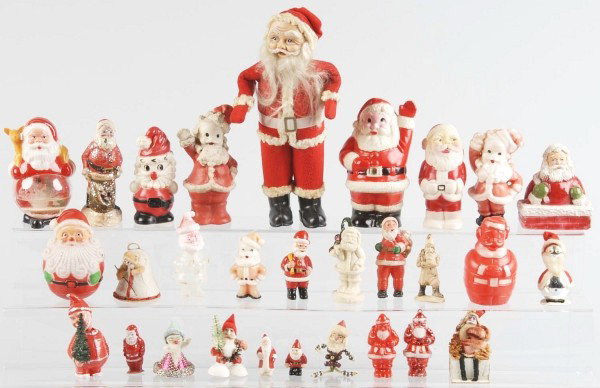 Large Lot of Santa Ornaments & Candy Containers.: Circa 1950s. Santa ornaments are celluloid, plastic, and rubber. They include an occupied Japanese Santa sitting on a box, several plastic Roly-Polys, several bisque pieces, an unusual candy container