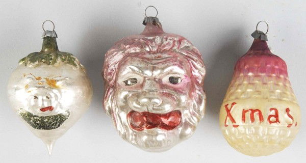 Lot of 3: Glass Figural Christmas Ornaments.: ADDITION – Includes a lion, a bell, and a turnip with a black lady in a kerchief eating a watermelon on one side and a boy’s head on the other. Condition (Excellent).