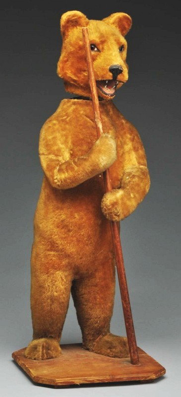 Large Clockwork Bear Nodder.: Standing bear, when wound head tilts from side to side. Covered in mohair. Glass eyes and open mouth with teeth exposed. Condition (Excellent). Size 31 - 1/2"" T."