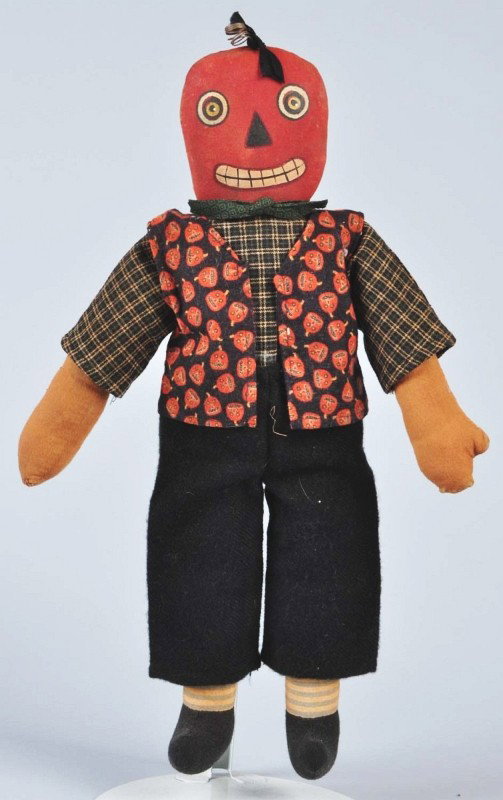 Halloween Rag Doll with Pumpkin Head.: Original clothing and painted face. Condition (Excellent). Size 17"" T."