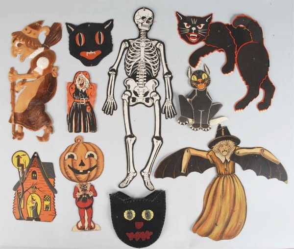 Lot of 10: Cardboard Halloween Cutouts.: Includes four cats, two witches, one skeleton, one German die-cut witch, one American house with witch inside, and one American pumpkin head. Some minor losses to two or three of the cardboard pieces.