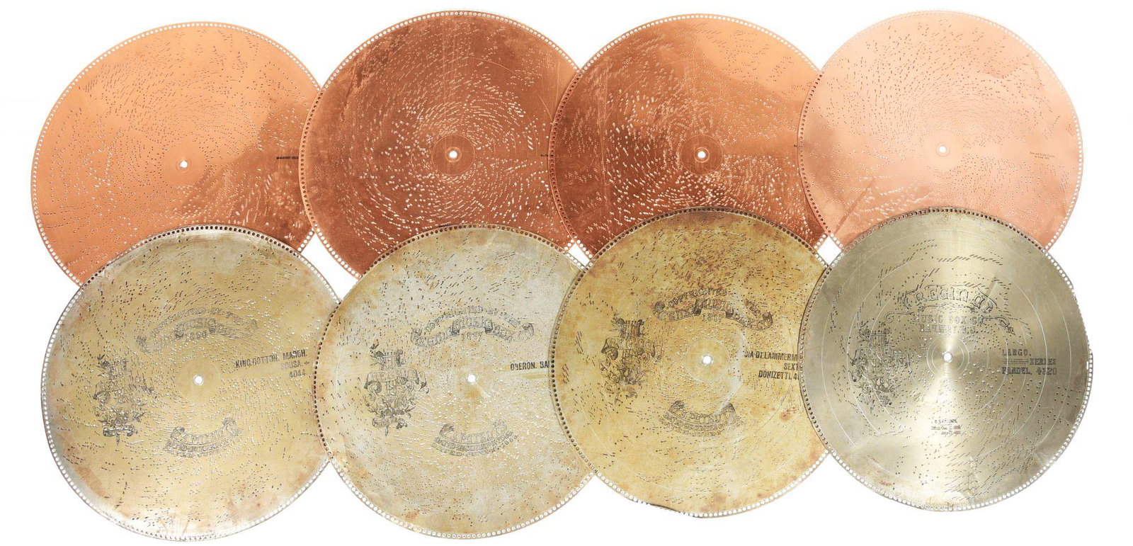 LOT OF MUSIC DISCS.: These music discs come in various sizes and from various manufacturers. CONDITION: Shows areas of surface rust, oxidation and a light fold, or possibly a break in the perforated edges. Condition: (Goo