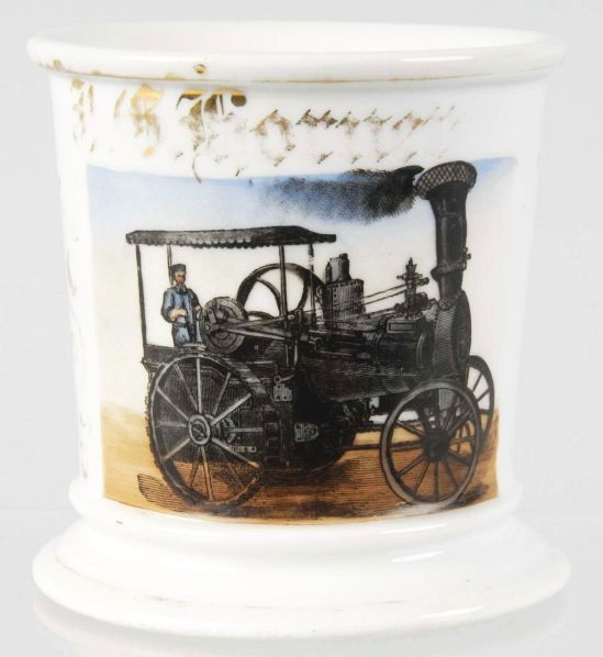 Steam Driven Tractor Shaving Mug.: Gilt name "TG Horner". Tight hairline on handle and no other noted cracks, chips, or repairs. Moderate to significant gold loss throughout. Condition (Very Good - Excellent). Size 3 - 5/8" T.