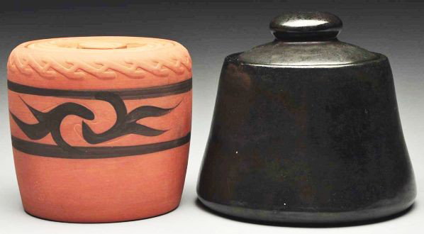Lot of 2: Arts & Crafts Pottery Humidors.: Includes one Fulper humidor in gun metal black marked Fulper under lid with original Keramidor paper label. Also includes one Clifton humidor in terracotta finish with black design around body. Condit