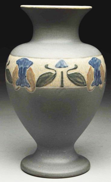 Roseville Victorian Art Vase.: Shape # 262-10". Egyptian banded center design on a gray background. Small glaze pop to rim. Two-inch hairline crack from top of rim going down. Condition (Excellent). Size 10 - 1/2" T.