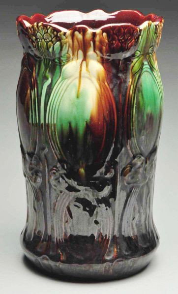 Weller Majolica Umbrella Stand.: Raised floral design with ruffled rim. Condition (Excellent). Size 18" x 10".