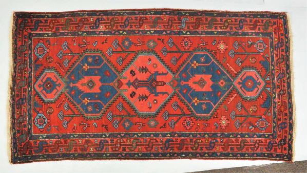 Antique Oriental Rug.: Iranian geometric design. A few moth patches throughout. Condition (Very Good). Size 6'6" x 3'6".