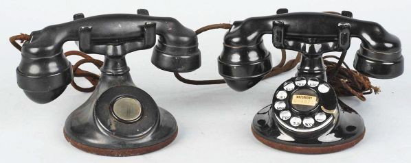 Lot of 2: Western Electric 102 Cradle Telephones.: Includes a non-dial, E1 with bullet transmitter, and a dial, E1 with bullet transmitter, 2HB dial, and slight fraying of cords. Condition (Excellent). Size Each: 5 - 1/2" T.