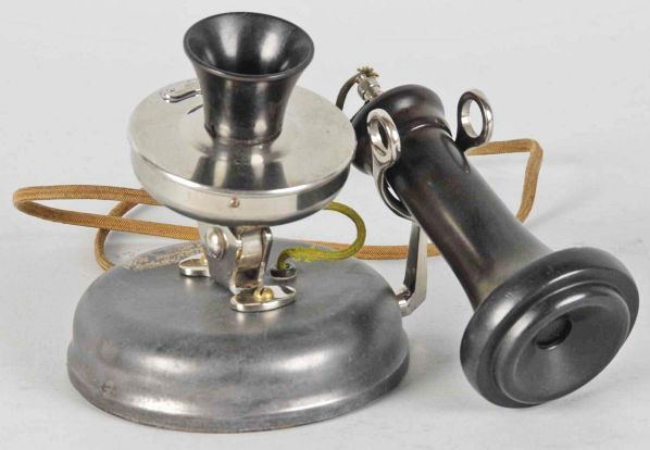 Western Electric No. 130 Doughnut Telephone.: Circa 1900. Steel, transmitter is a 228W nickel/brass with pony receiver. Condition (Excellent). Size 5" T.