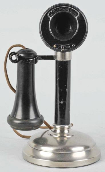 Monarch Candlestick Telephone.: Circa 1905. Cast iron base, steel shaft and cup, and brass perch and faceplate. Faceplate marked Monarch Telephone Manufacturing Company and base plate is partially missing. Condition (Excellent). Siz