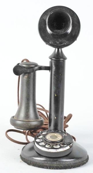 Bell Family Dial Candlestick Telephone.: Circa 1925. Phone has black paint over brass, perch marked 20CF, 4H dial, hook is replaced, and receiver and transmitter elements have been updated for better reception. Phone was purchased from the g