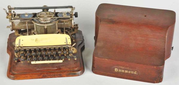 Early Hammond No. 12 Typewriter.: Working. Includes original case. Condition (Very Good - Excellent). Size 14 - 1/2" x 14".