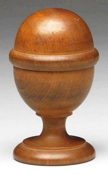 Wooden Screw-Top Container.: Wooden egg-shaped container with screw-on top. Possibly a pill silverer, which was used to coat round pills with silver to mask the bitter taste. One three-inch-long crack on top piece. Condition (Exc
