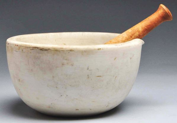 Ceramic Pharmacy Mortar & Pestle.: Circa early 20th Century. Large Wedgwood ceramic mortar and pestle used to pulverize solid crude drugs. Sold by Whitall Tatum Co. Wedgwood pestle is attached to a wooden handle. Shows wear from normal