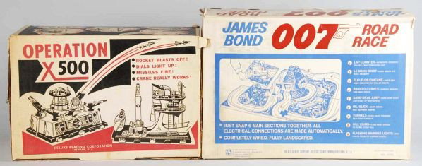 Lot of 2: Plastic Play Sets.: 1960s. Both in their original boxes. Includes one A.C. Gilbert James Bonds 007 Road Race set marked "1965" on box. Includes both cars (Mustang and Aston Martin), track, etc. Also includes one Deluxe R