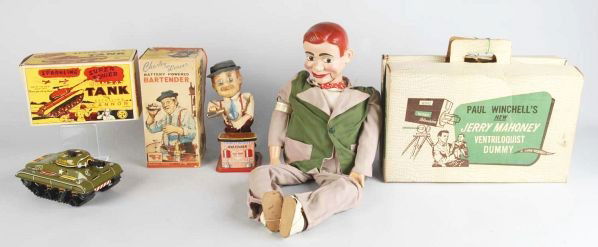 Lot of 3: Character Toy Items.: Includes Paul Winchell's Jerry Mahoney ventriloquist dummy, battery-operated Charlie Weaver bartender, and Marx wind-up Combat Tank. Some wear overall. Includes all original boxes. Condition (Very Goo