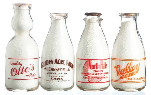 Lot of 4: Pennsylvania Milk Bottles.: Lot includes one bottle from Golden Acre Farm in Sewickley, one from Valley Dairy Co. in East Pittsburgh, one from Otto's, and one from North Hills Dairy in Pittsburgh. Condition (Very Good - Excellen