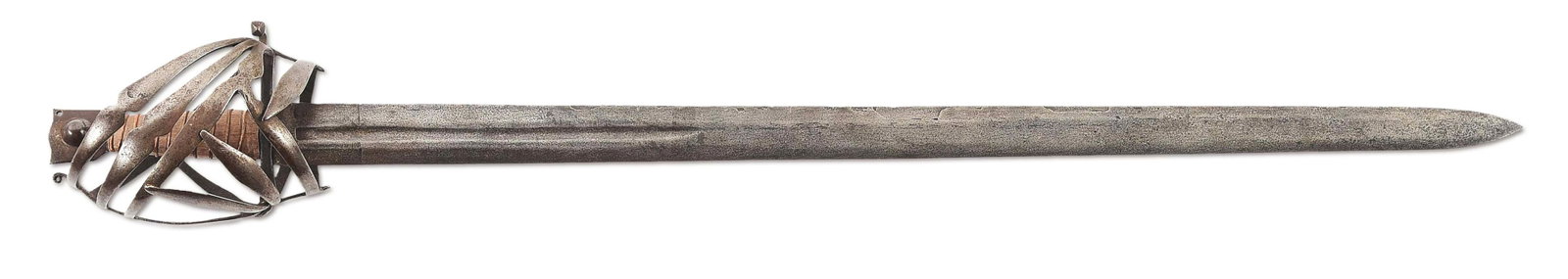 A GOOD COMPOSITE EUROPEAN SCHIANOVA.: Blade measures 30 - 1/2" from tip of blade to base of ricasso, both sides with 10" fuller. Illegible maker marks ahead of fuller. Double edged blade with spearpoint tip. Hilt in the form of a schianov