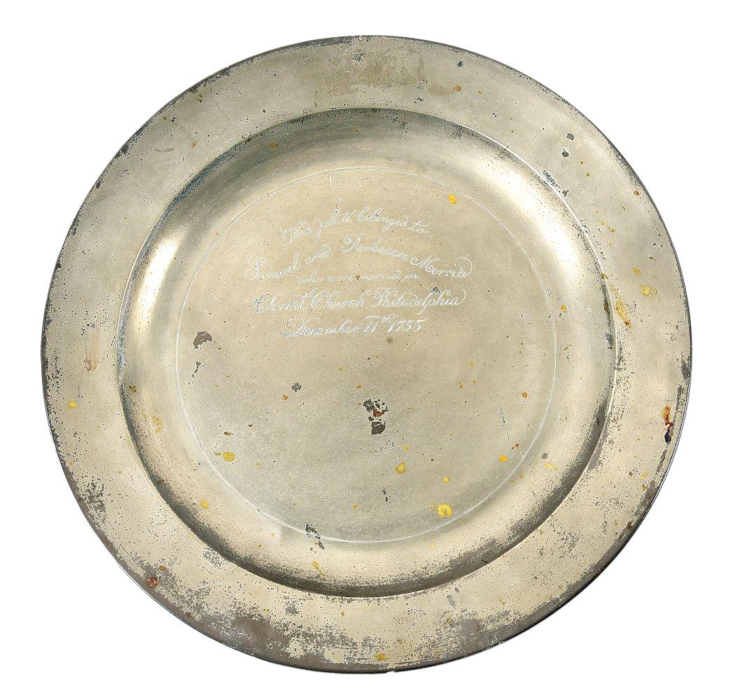 18TH CENTURY PEWTER CHARGER ENGRAVED TO SAMUEL MORRIS.: Mid-late 18th century pewter charger engraved to a Revolutionary War soldier and prominent Philadelphian Samuel Morris. The charger has a diameter of 16 - 1/2" inches and is engraved "This plate belon