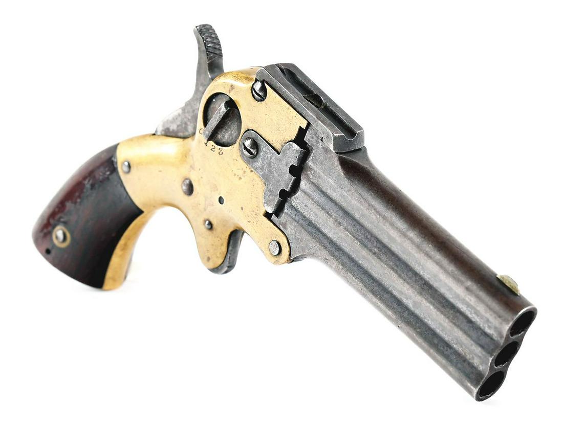 (A) MARSTON 3 BARREL SELECTABLE POCKET DERRINGER.: An interesting brass framed 3-barrel derringer with exposed hammer and spur trigger. Barrel selecting lever on the right side. 2-piece varnished wood grip panels. Half moon German silver front sight w