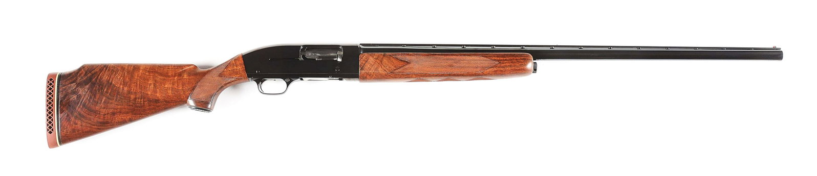 (C) FINE WINCHESTER MODEL 50 DELUXE 12 BORE SEMI-AUTOMATIC SHOTGUN (1959).: Winchester Model 50 Trap Gun made by Winchester Repeating Arms Company in 1959. Blued 30" Full choked Winchester Proof Steel factory ventilated rib barrel in 12 gauge with 2 - 3/4" chambers. Blued ste