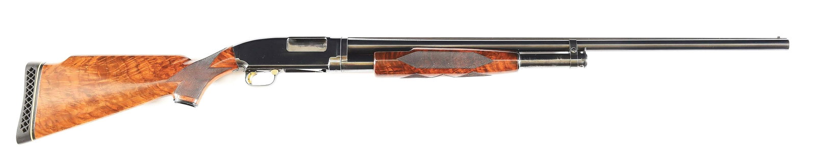 (C) WINCHESTER MODEL 12 CUSTOM SLIDE ACTION SHOTGUN: Beautifully customized Winchester Model 12 originally made by Winchester Repeating Arms Company in 1940. 30" Winchester Proof Steel 12 gauge barrel with Winchester full slid raised rib, twin bead sigh