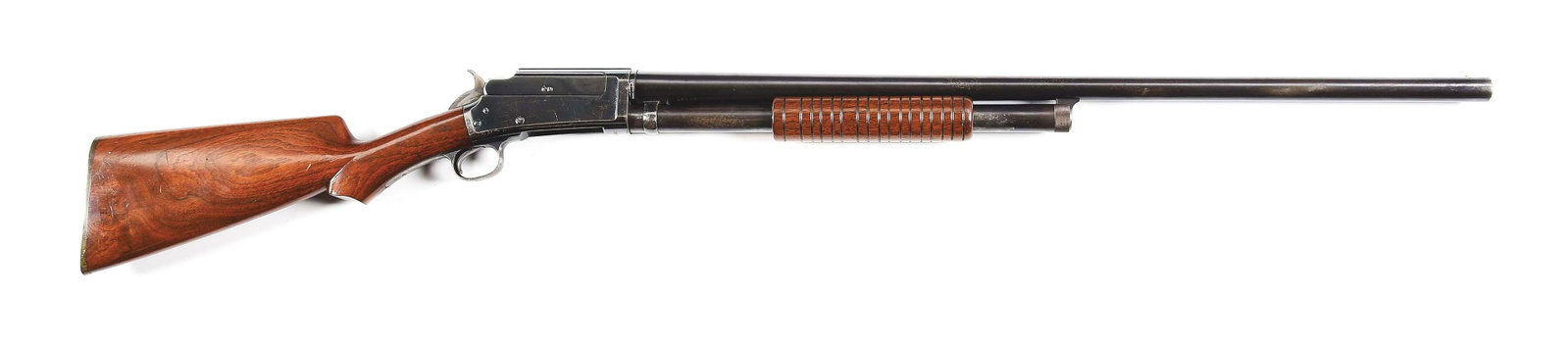 (C) MARLIN MODEL 1898 SLIDE ACTION SHOTGUN: Manufactured circa 1898-1905 with 30" barrel in 12 gauge with bead front sight. Slide action with grooved walnut slide and walnut pistol gripped stock with ribbed factory composite buttplate. Frame is