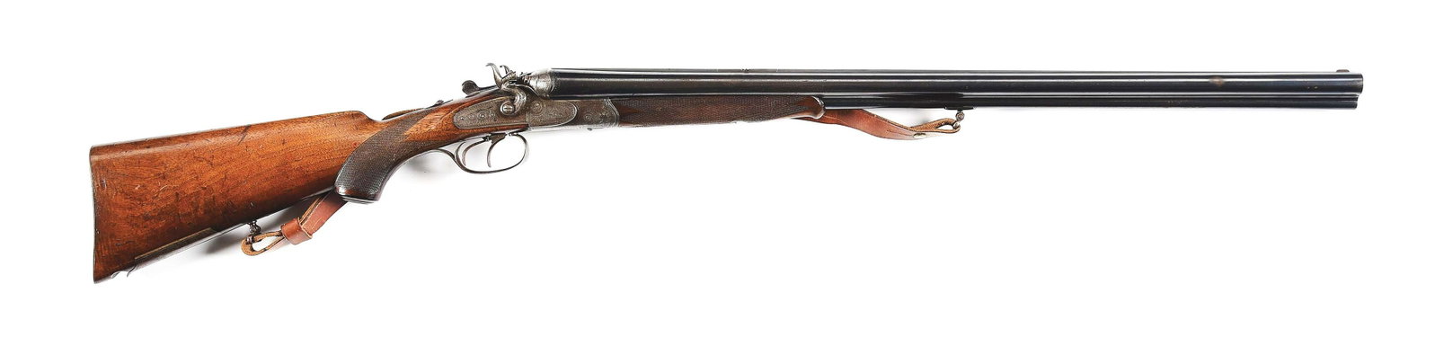 (C) GERMAN DRILLING COMBINATION GUN.: German external hammer drilling with side by side shotgun barrels over rifled barrel, made in Germany by Timner, Coblenz in 1924. 27" blued Nitro Steel barrels with matted rib and barrels marked "TIMN