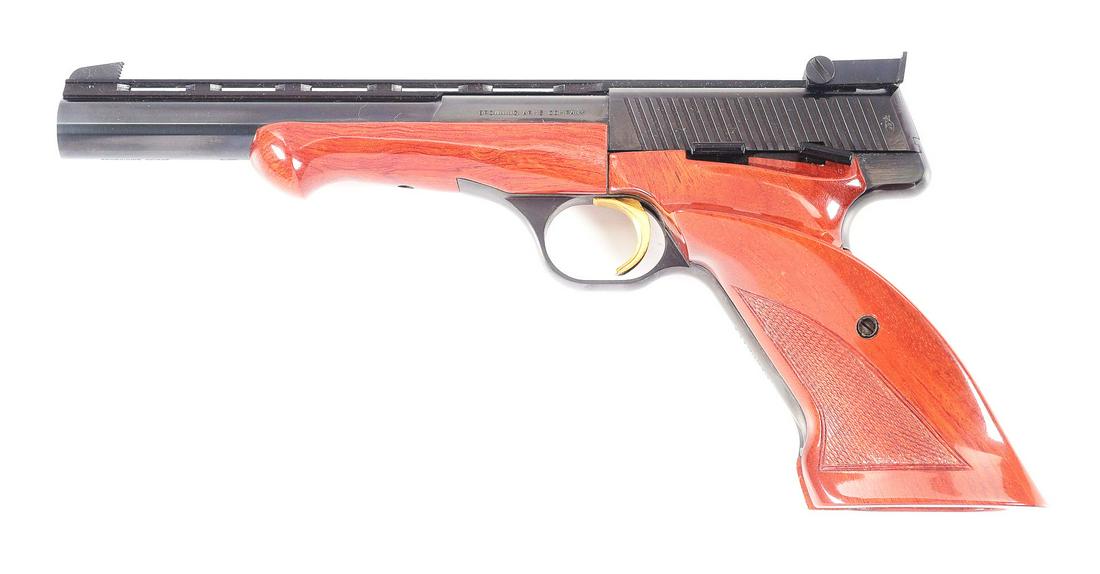 (M) BELGIAN BROWNING MEDALIST SEMI-AUTOMATIC HANDGUN WITH CASE & ACCESSORIES.: Medalist pistol manufactured by Browning. The left side of the barrel is stamped "BROWNING ARMS COMPANY" while the right side is stamped "MADE IN BELGIUM 22 L.R.". Bottom of barrel is stamped with "BR