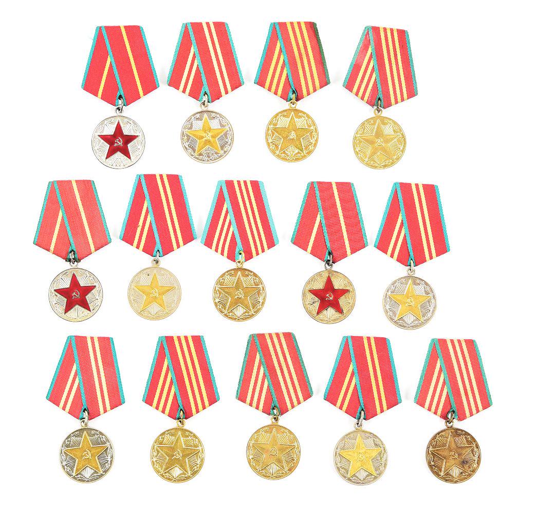 LOT OF 14: SOVIET RECOGNITION OF SERVICE ORDERS.: Lot contains 14 service orders (from 10 to 20 years) for the postwar Soviet Ministry of Defense, Ministry for Internal Affairs, Committee of State Security, MVD RSFSR, and KGB. CONDITION: Overall exce