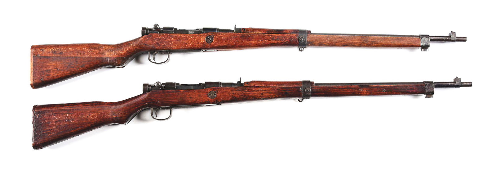 (C) LOT OF 2: LAST DITCH NAGOYA TYPE 99 BOLT ACTION RIFLES.: Lot consists of 2 Japanese Last Ditch Type 99 military bolt action rifles made at Nagoya Arsenal in Japan. (A) Rifle has a 26" blued barrel with protected notch front sight and rear late style fixed r