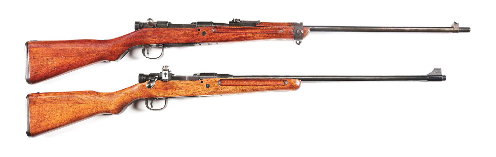 (C) LOT OF 2: SPORTERIZED TOKYO JUKI KOGYO AND KOKURA TYPE 99 RIFLES WITH INTACT MUMS.: Lot consists of two sporterized Japanese Type 99 military rifles made at Tokyo Juki Kogyo and Kokura Arsenals in Japan. (A) Rifle has a 26" blued barrel with protected notch front sight and rear flip 
